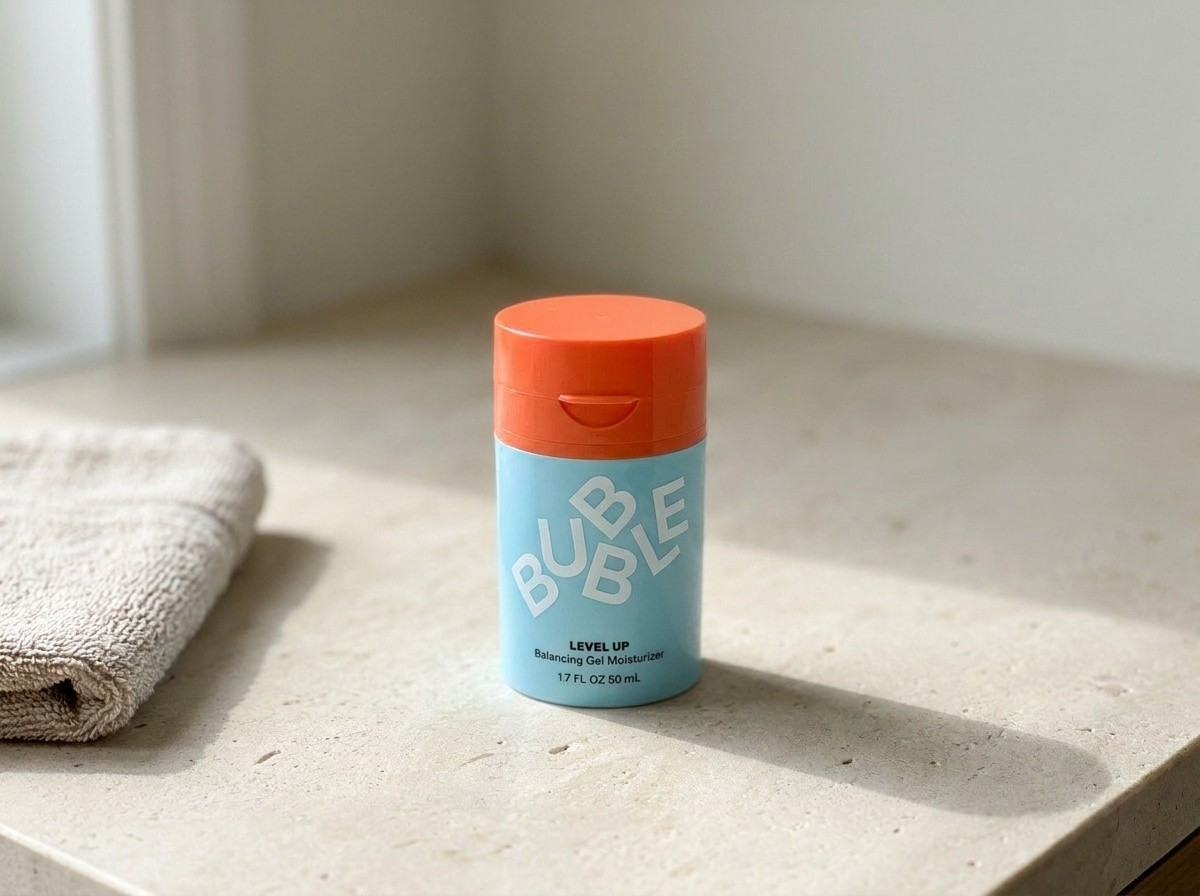 Bubble Level Up Balancing Gel Moisturizer on a warm stone vanity