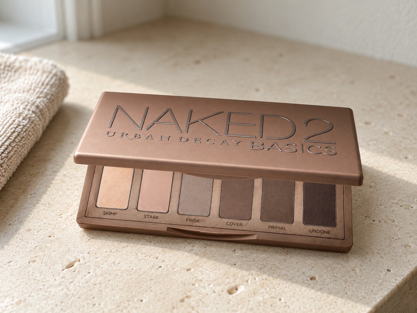 Urban Decay Naked2 Basics on a warm stone vanity